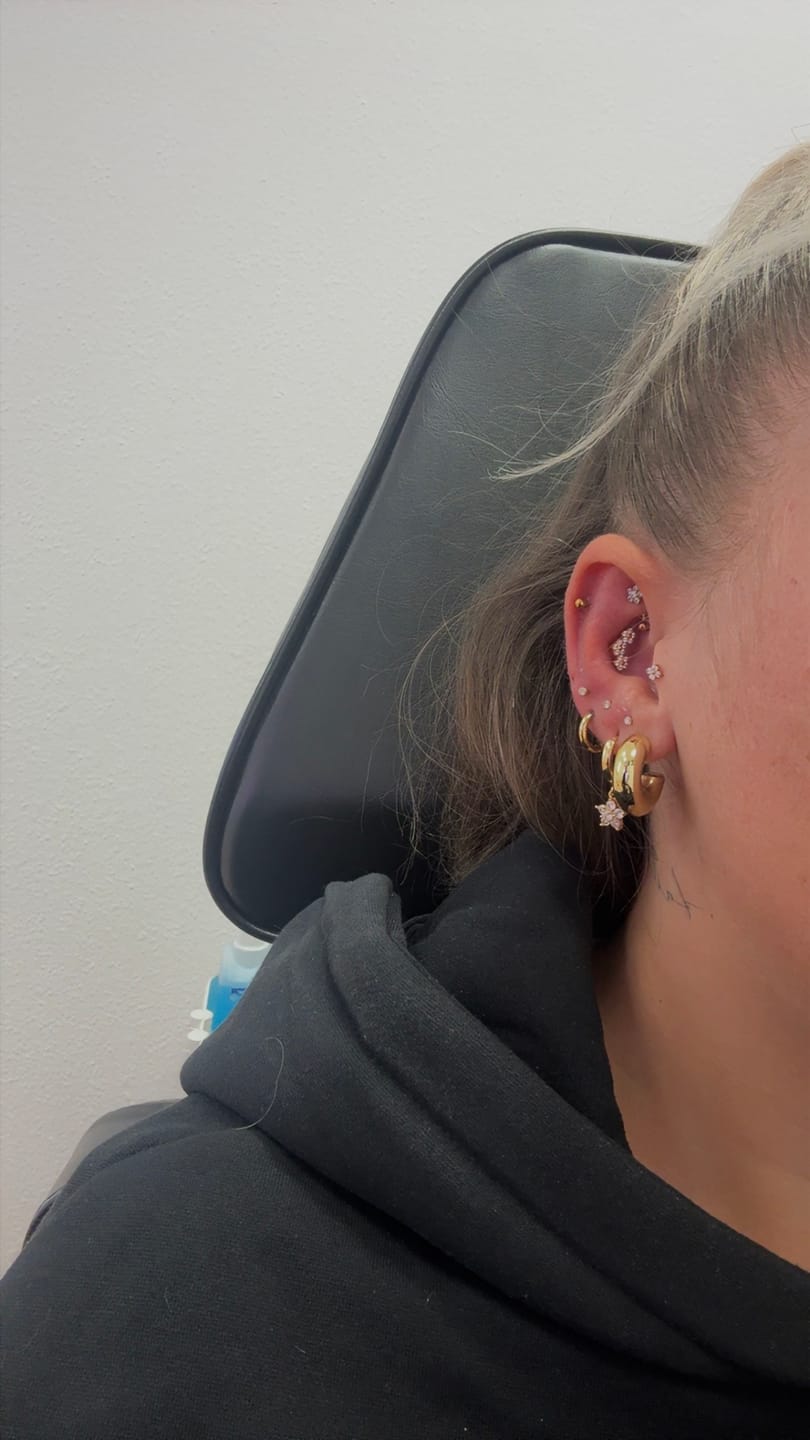 Customer photo review of Bloomy Piercing | Titan