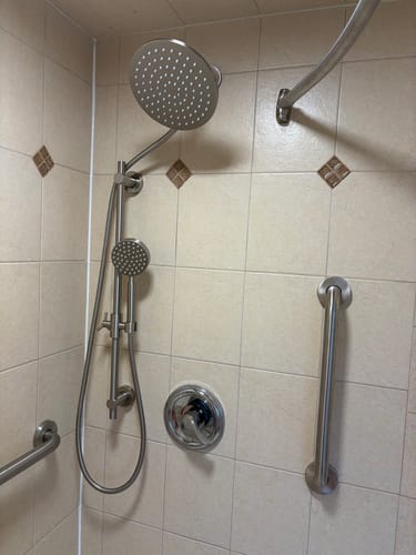 Customer's beautiful Dual Shower Head with Slide Bar Set installed in a tiled shower.
