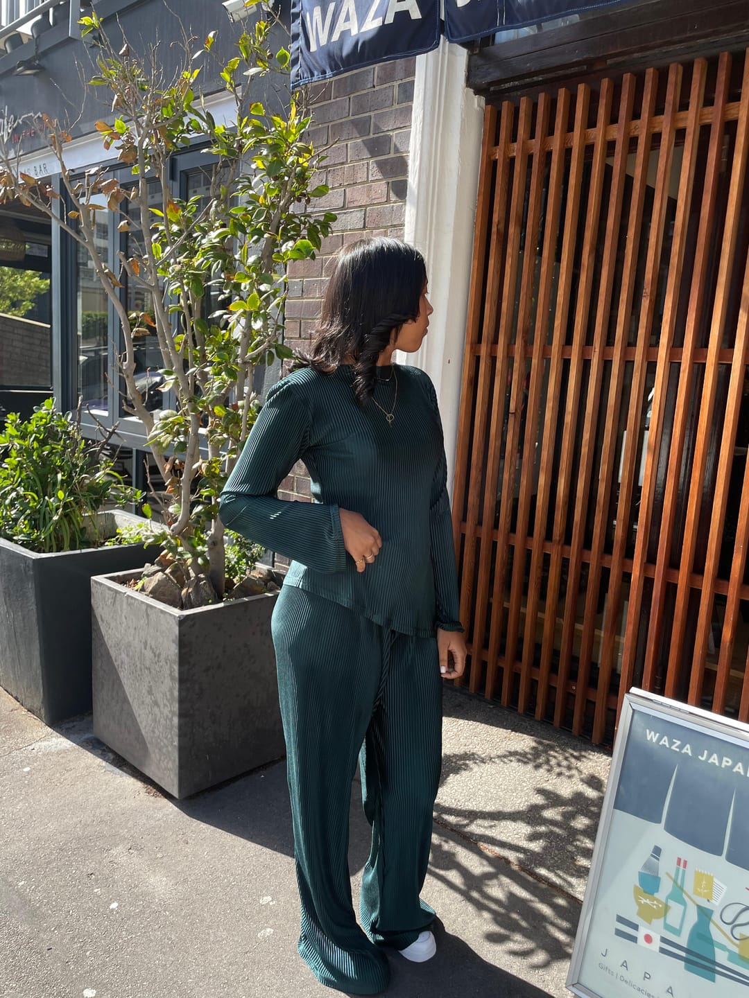 Customer photo review of Emerald Pleated Asymmetrical Bell Sleeve Top