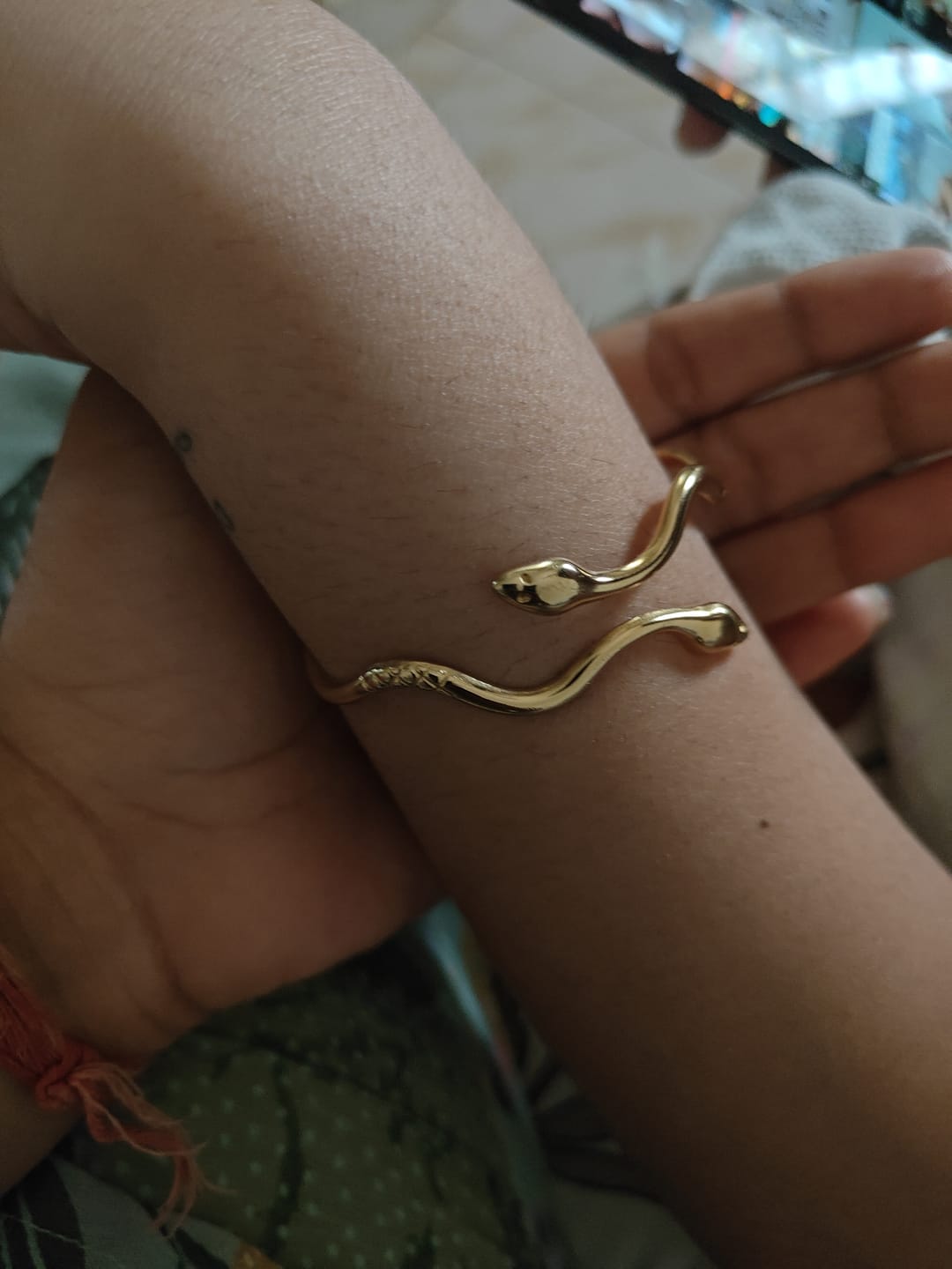 Customer photo review of Minimalist Golden Ripple Snake Bracelet