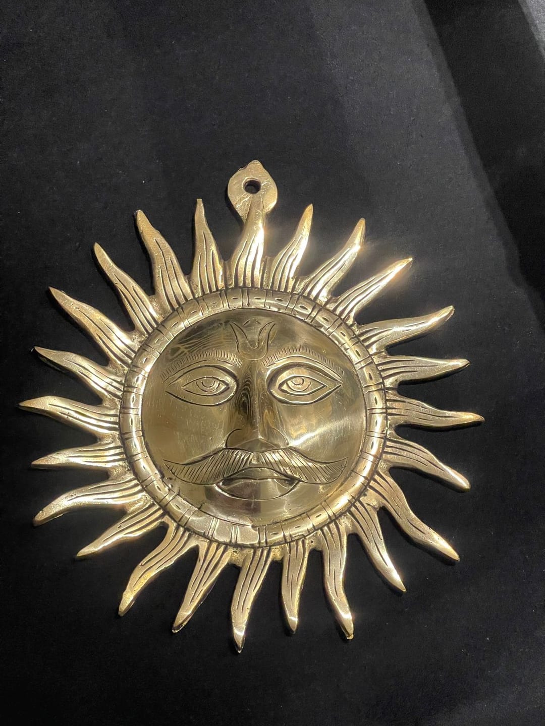 Customer photo review of Brass Surya (Sun) Ji Wall Hanging Idol Vastu Remedy for East Direction Balance, Fame and Positive Energy | 24 X 24 cm | 1 kg