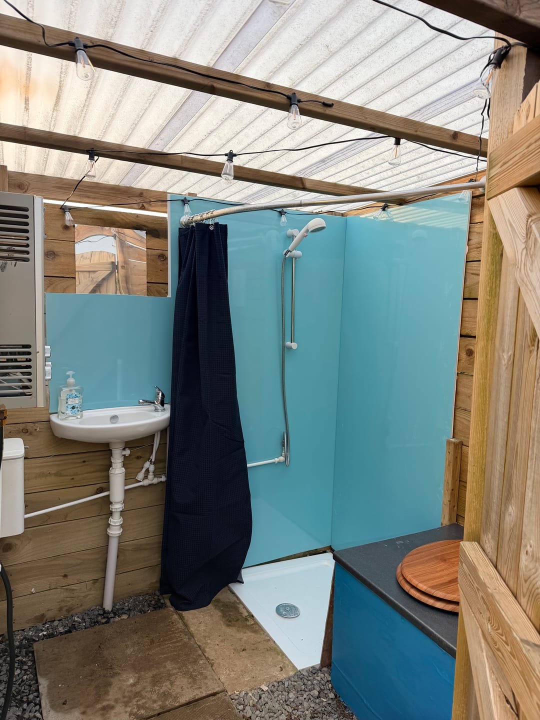 Customer photo review of 10mm Aqua Blue Shimmer Gloss Shower Panel 1M x 2.4M