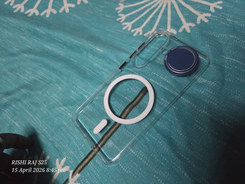 Customer's clear Anti Yellow Magsafe Case for Samsung Galaxy S25 with a blue magnetic accessory attached to the back.