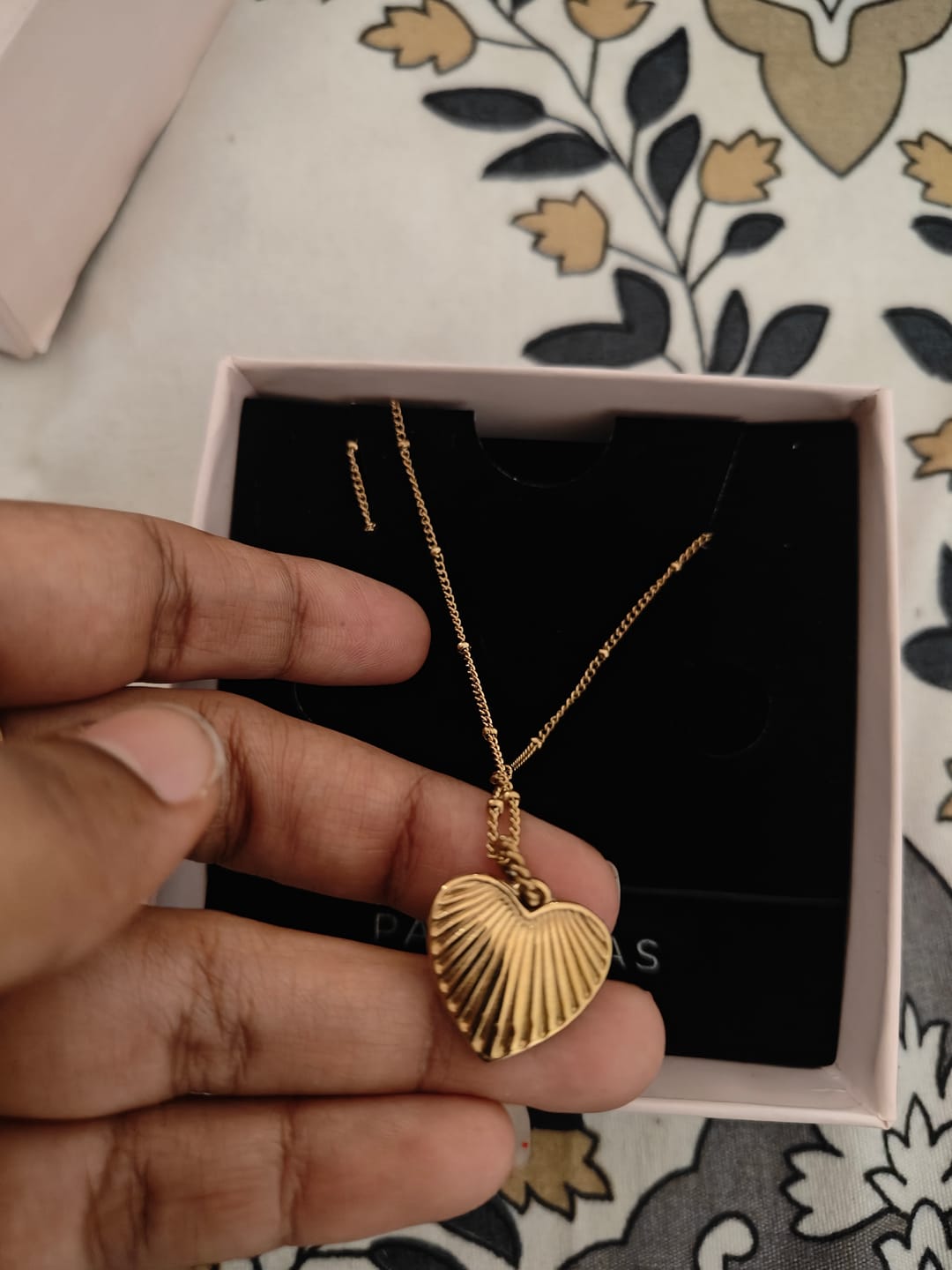 Customer photo review of Heart Rays Necklace