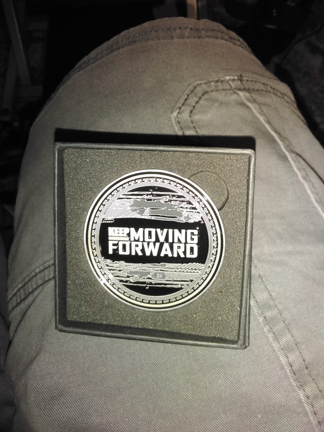 Customer photo review of Keep Moving Forward - Challenge Coin