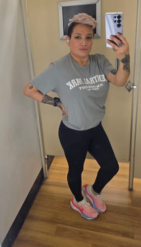 Reviewer showing the fit of the black 3D Anti-Cellulite Leggings in a full-length mirror selfie.