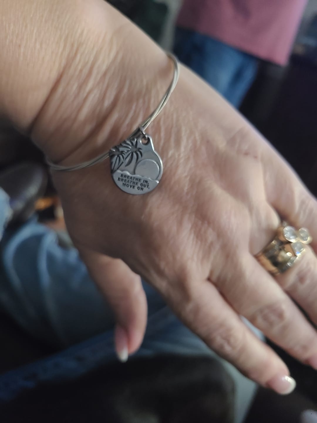 Customer photo review of “Breathe In, Breathe Out, Move On” Guitar String Bracelet