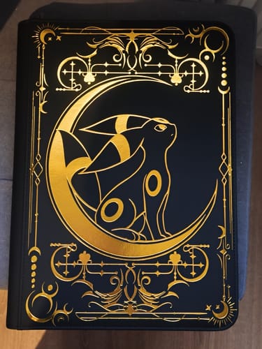 Customer photo review of Lunar Shadow 9-Pocket Trading Card Binder
