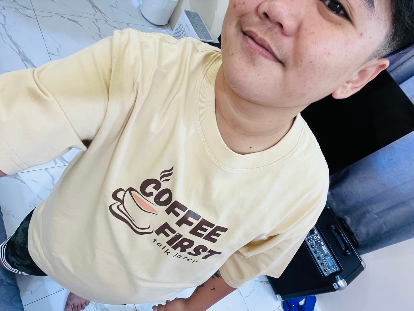 Customer photo review of Coffee First, Talk Later Oversized Tee - 100% Premium Cotton