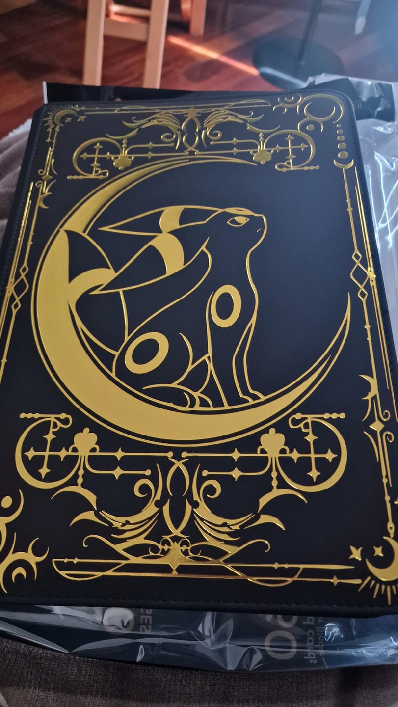 Customer photo review of Lunar Shadow 9-Pocket Trading Card Binder