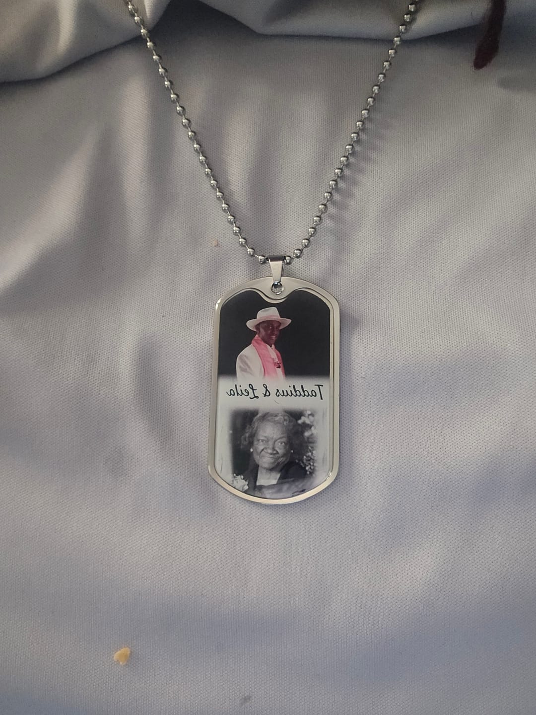 Customer photo review of Custom Name and 2 Photos Memorial Dog-tag Necklace Gift