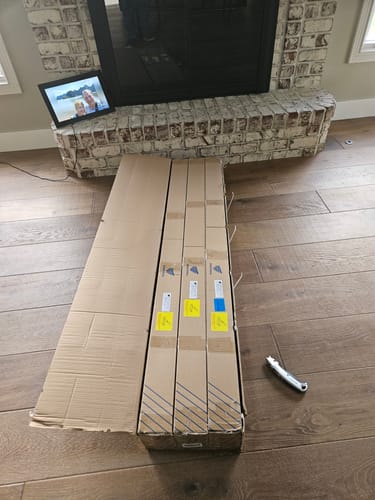 Customer photo review of SmartWings Motorized Light Filtering Roller Shades 70% Blackout Essential