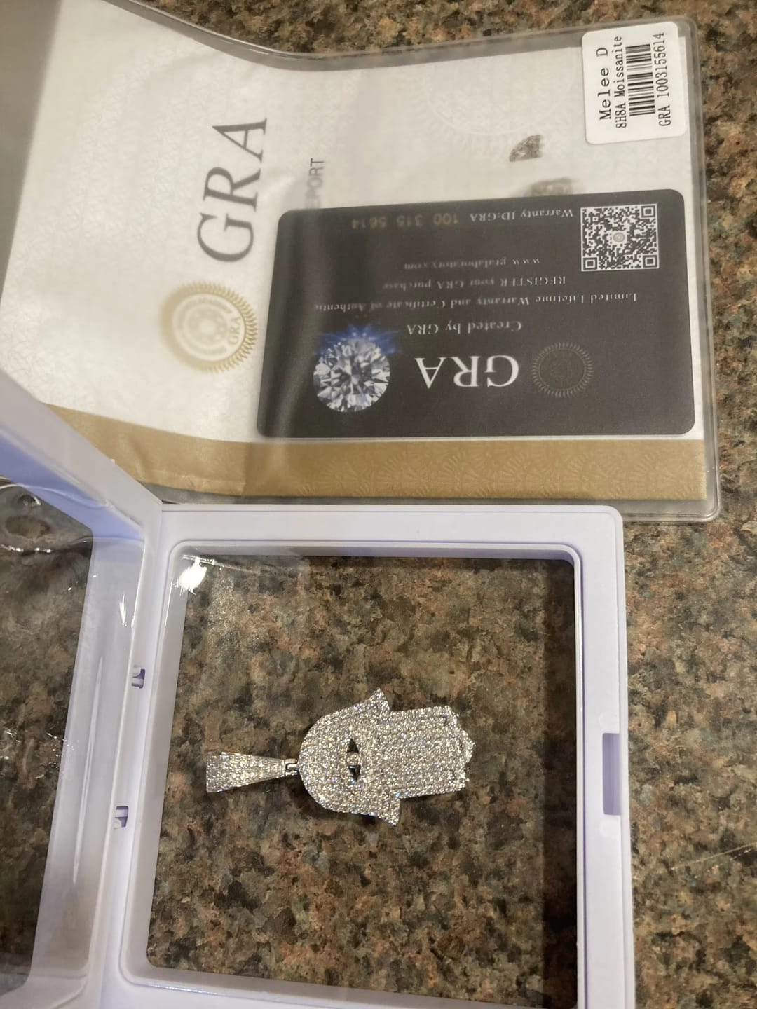 Customer photo review of GL Eyes Hand of Fatima Hip Hop Jewelry S925 Silver Moissanite Pendant