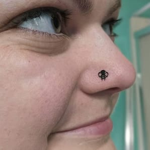 Customer photo review of Cat Skull Silhouette Nose Stud + Earring