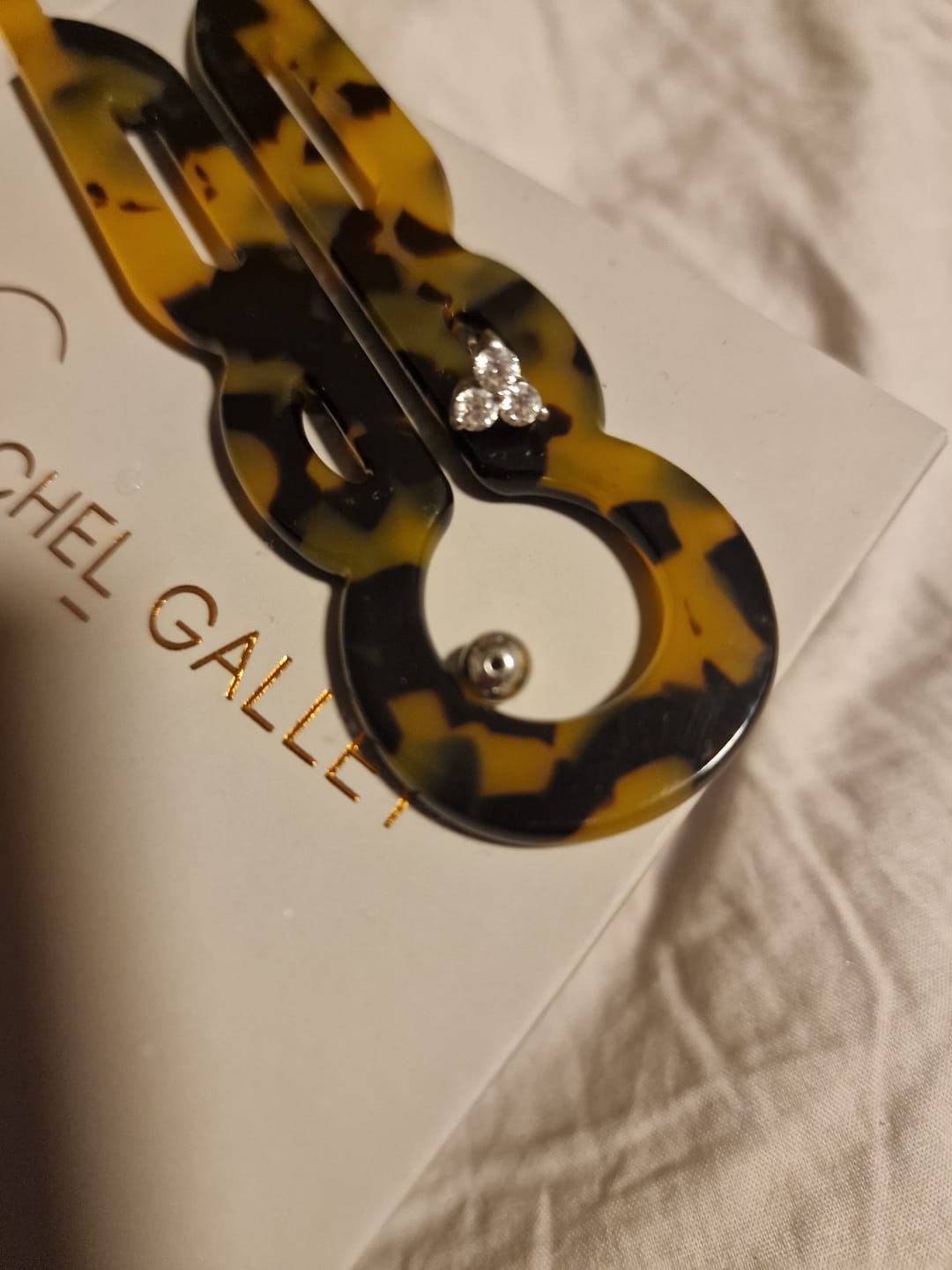 Customer photo review of Moissanite Trinity Sleep Stud Earrings