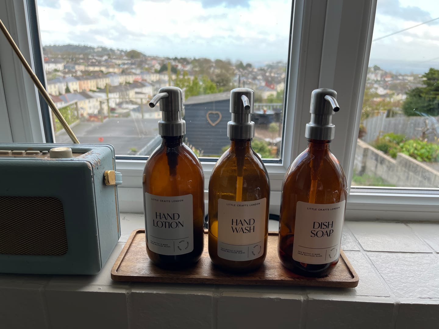 Customer photo review of 500ml Amber Glass Bottle with Metal Pump White Label