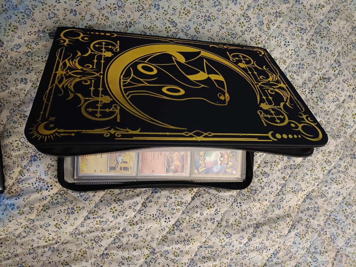 Customer photo review of Lunar Shadow 9-Pocket Trading Card Binder