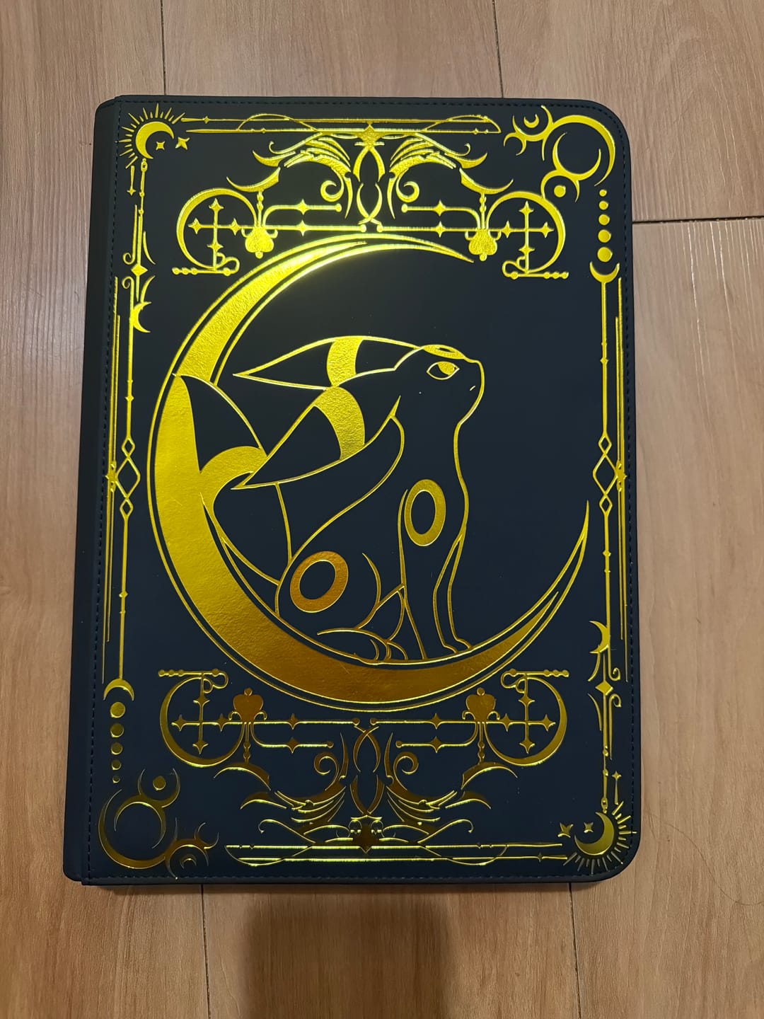 Customer photo review of Lunar Shadow 9-Pocket Trading Card Binder