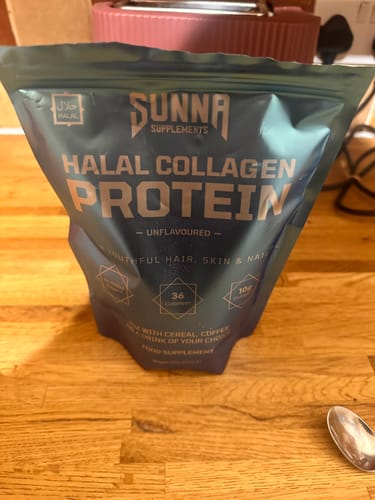 Customer's pouch of Sunna Supplements Halal Collagen Protein resting on a wooden surface.