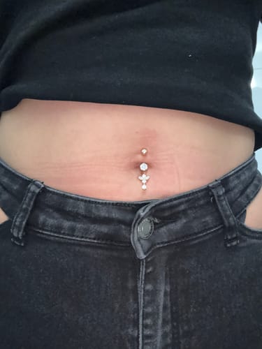 Customer photo review of Timeless Lotus Belly Piercing - Titan