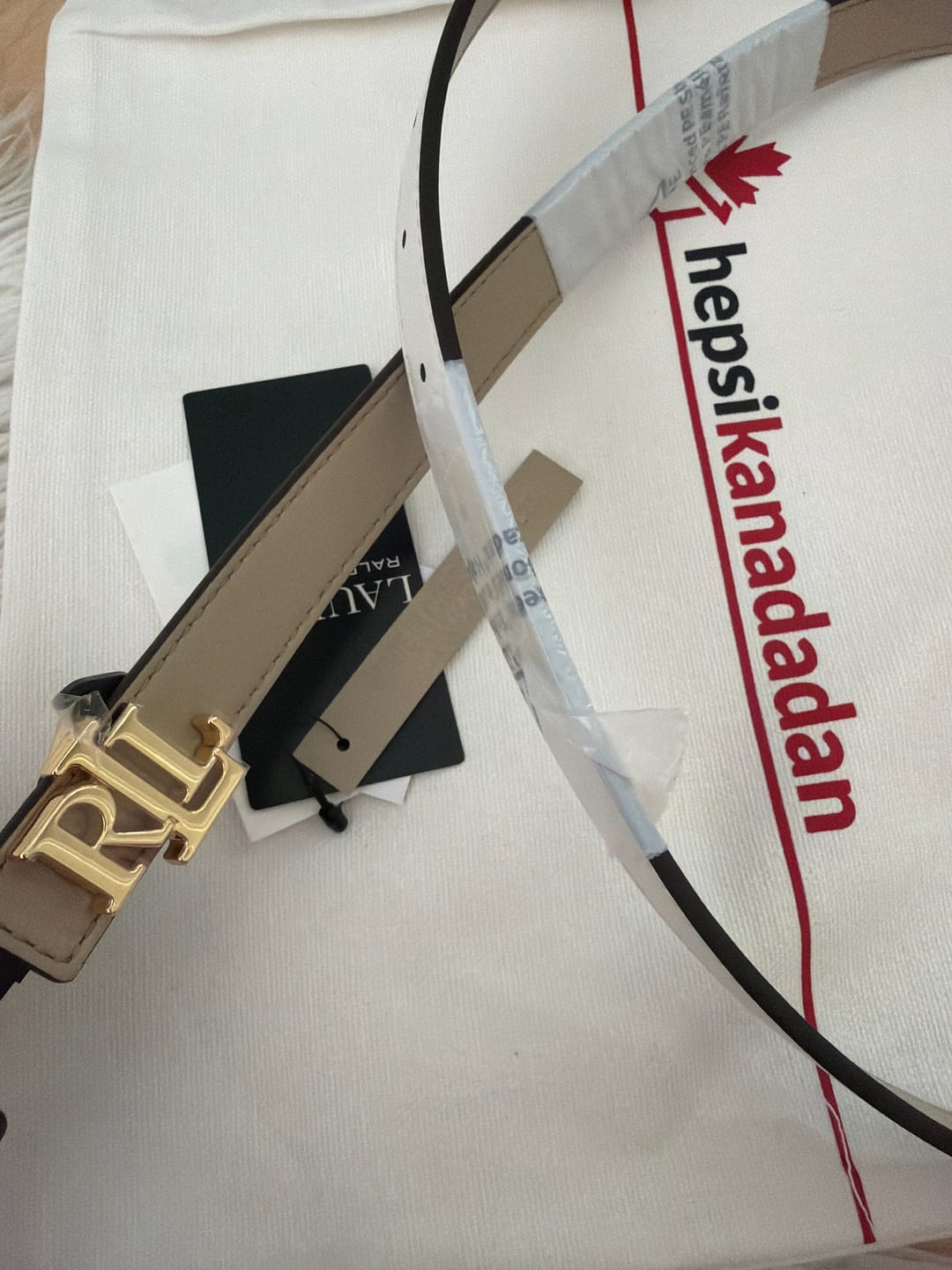 Customer photo review of Polo Ralph Lauren Women's Logo Reversible Leather Skinny Belt Birch Tan/White