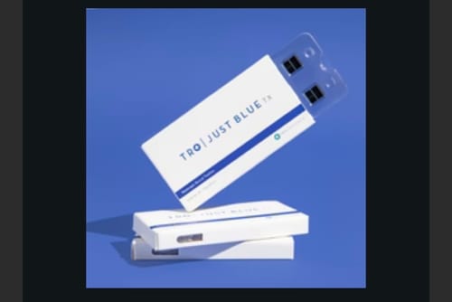 Customer's three boxes of Just Blue, with one open box revealing the dark troches in a blister pack.