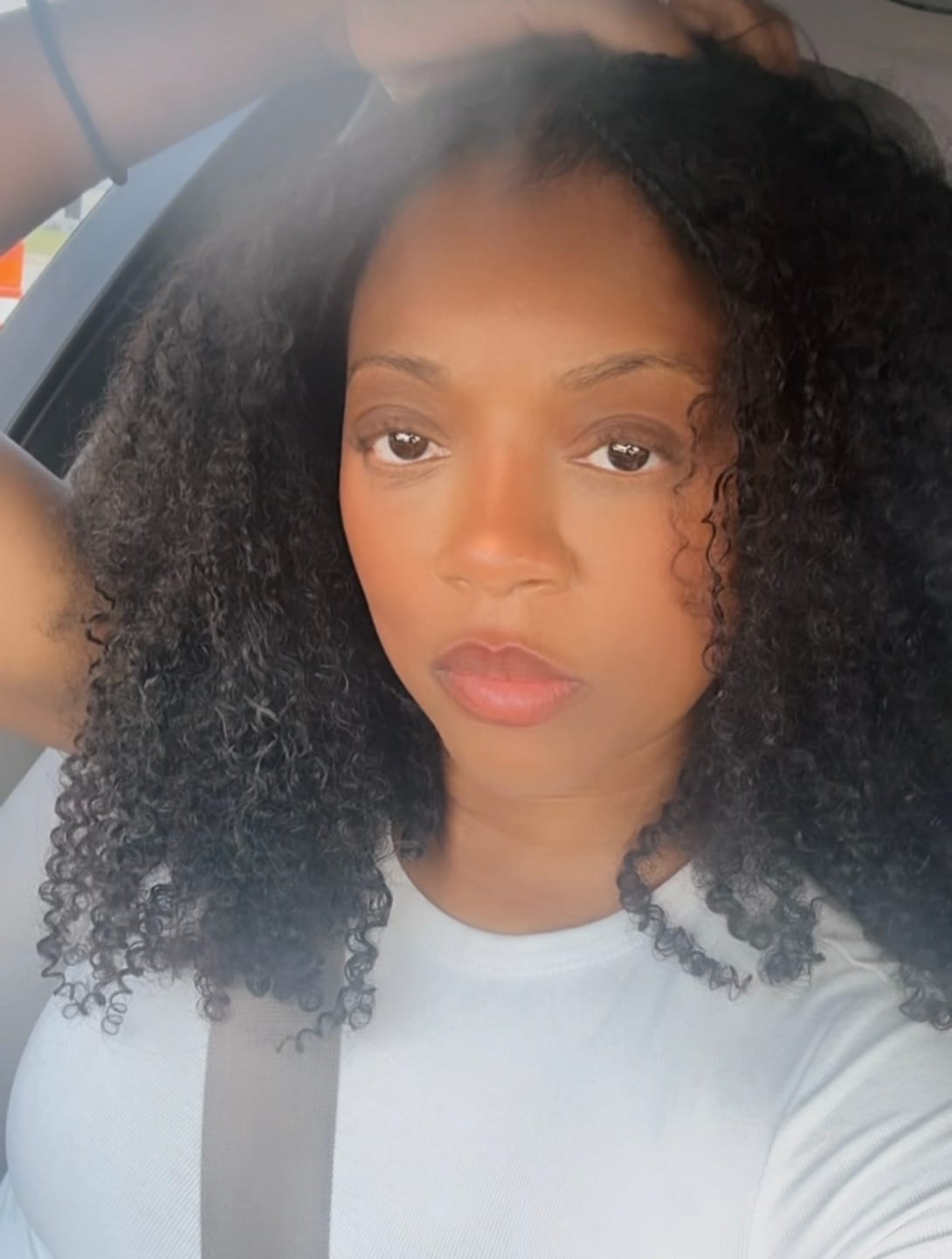 Customer photo review of Multi-Textured Kinky Curly Bulk Hair Extensions for Braiding