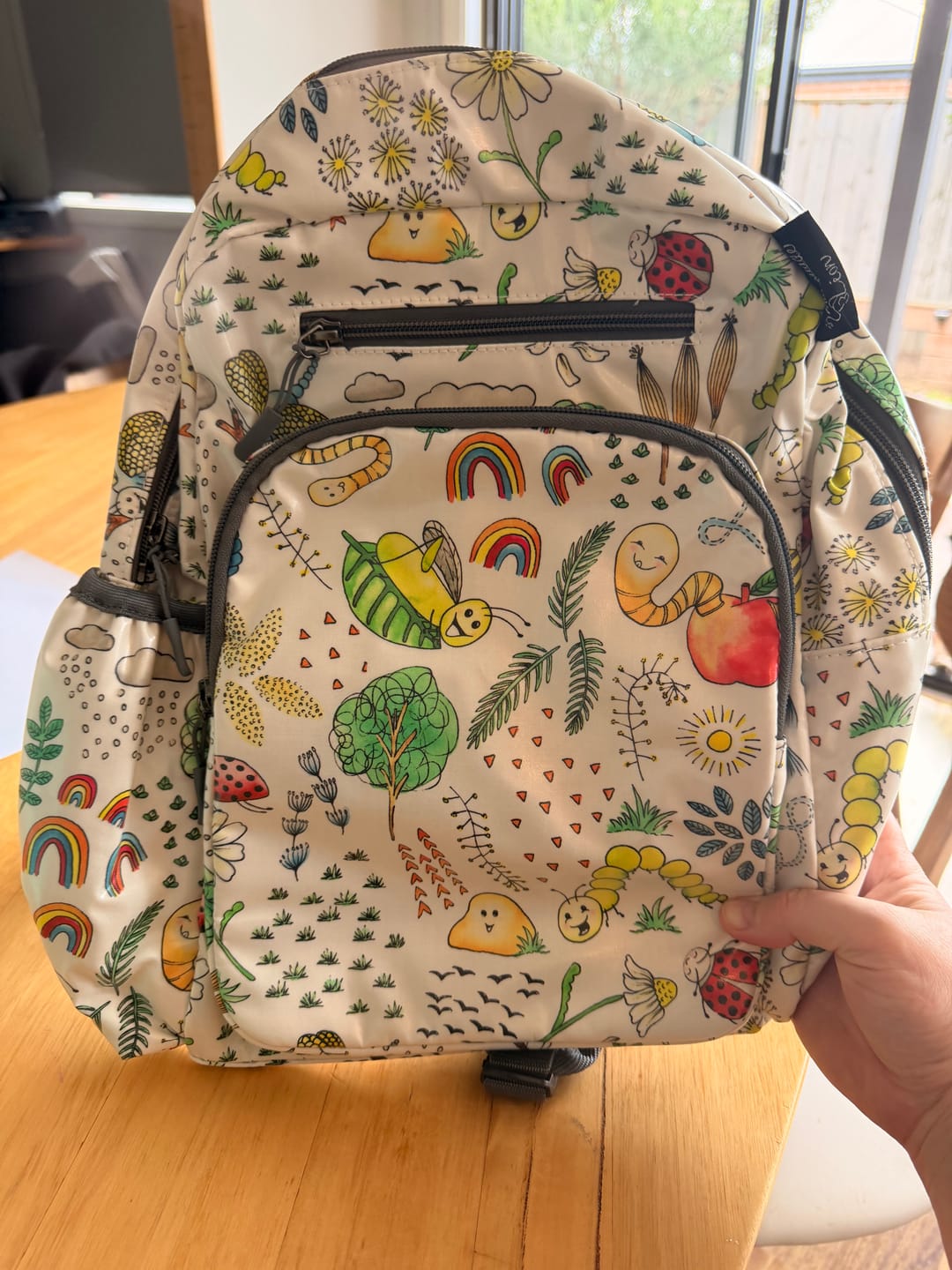 Customer photo review of Little Creatures Expect-A-Spill Backpack