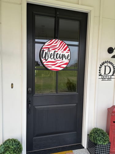 Customer photo review of Zebra Print Welcome Board Door Hanger