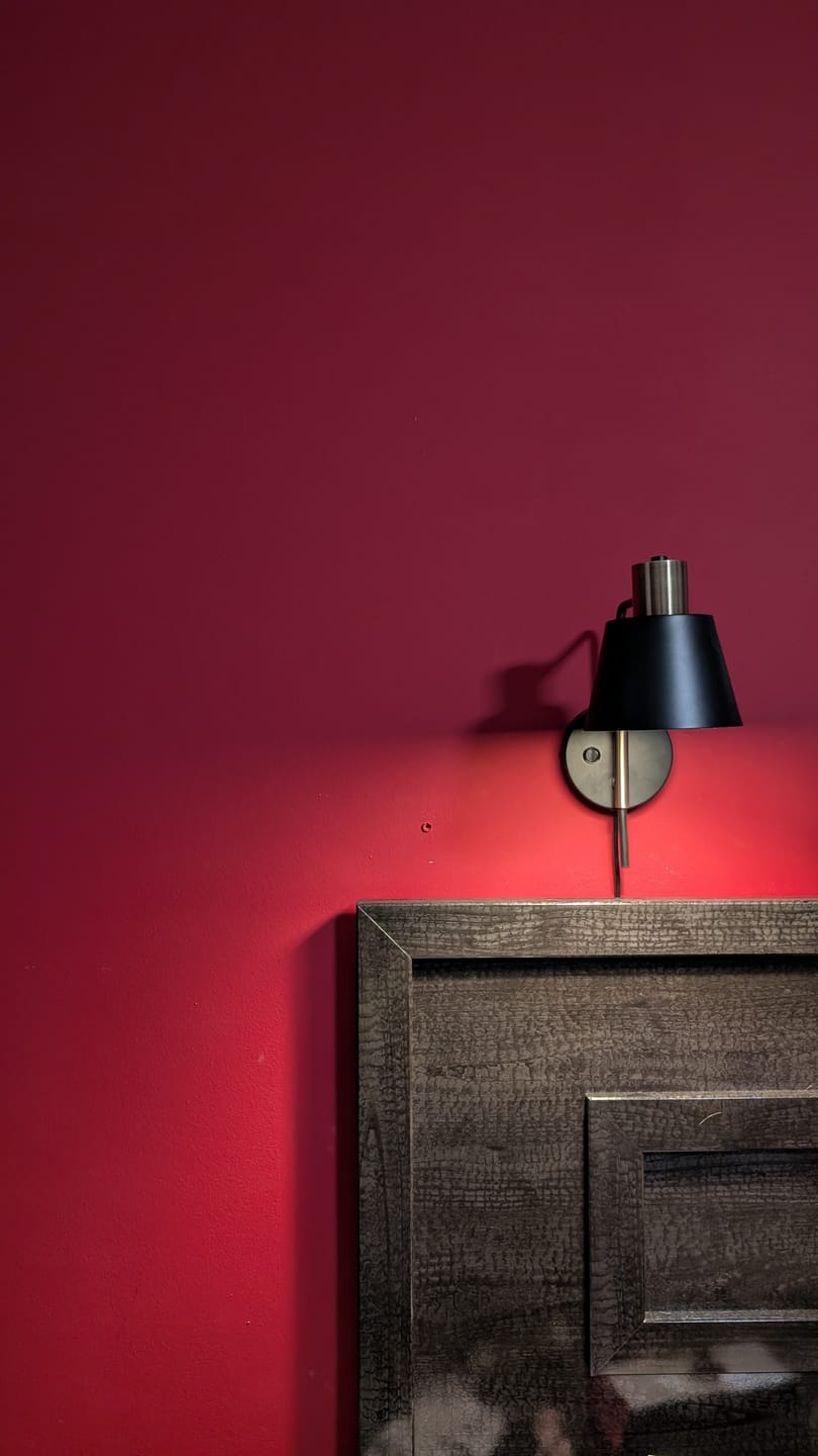 Customer photo review of Cromwell Black And Antique Brass Wall Light with Cord and Plug