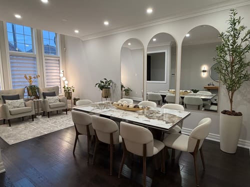 Customer's three Gold Full Length Arch Mirrors mounted side-by-side on a dining room wall.