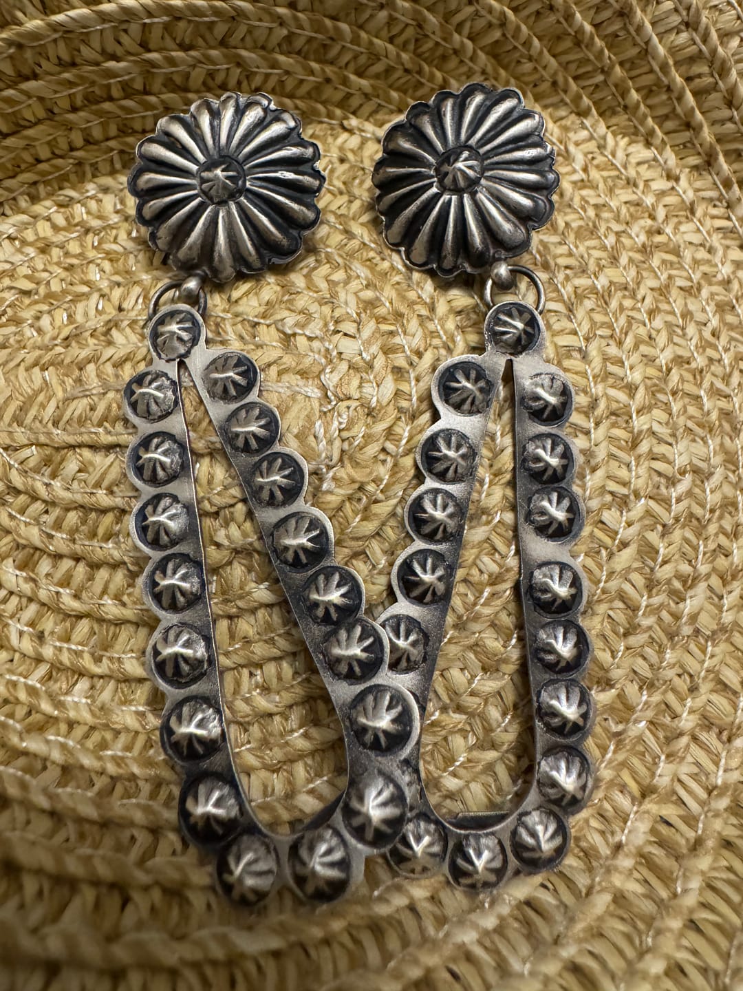 Customer photo review of Handcrafted Sterling Silver Dangle Concho Earrings By Eugene Charley