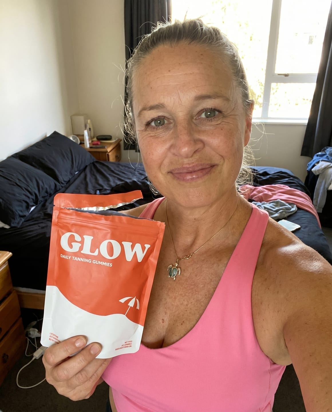 Customer photo review of Glow Tanning Gummies