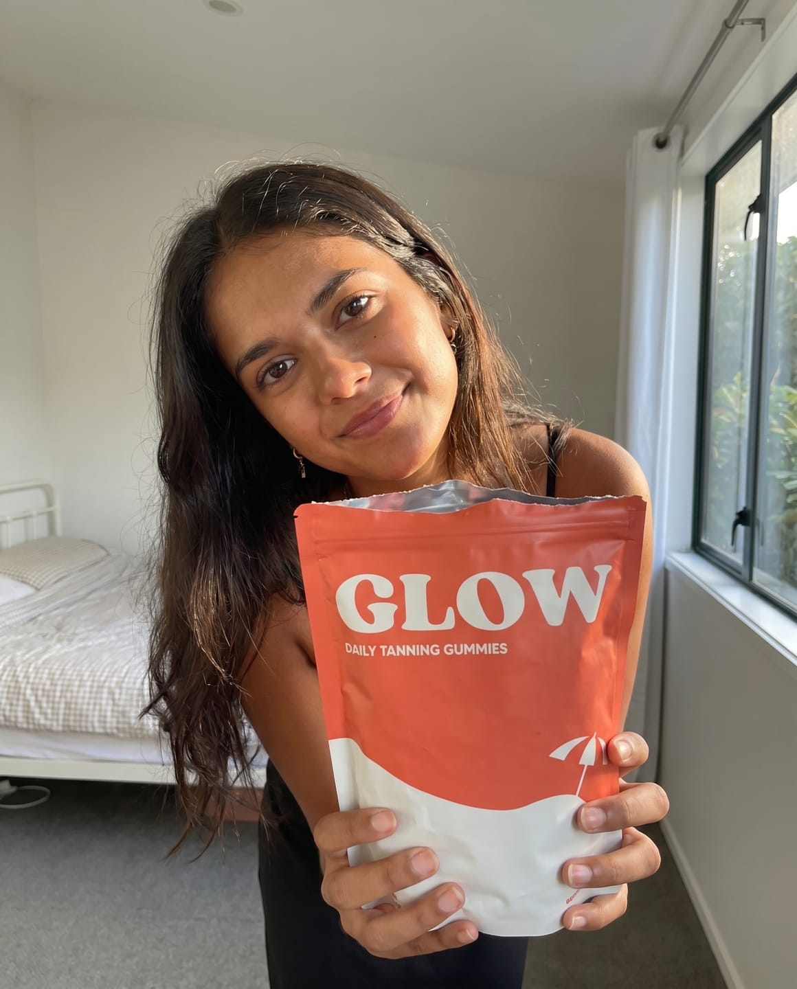 Customer photo review of Glow Tanning Gummies