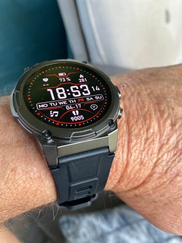 Customer's photo of a smartwatch on their wrist, posted with a review for the company.