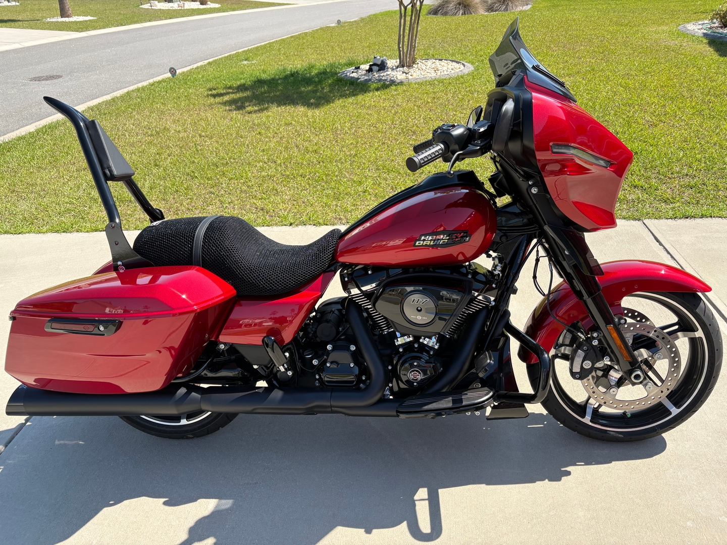 Harley bagger with breathable Wind Rider mesh seat cover installed, parked at a desert highway pull-off