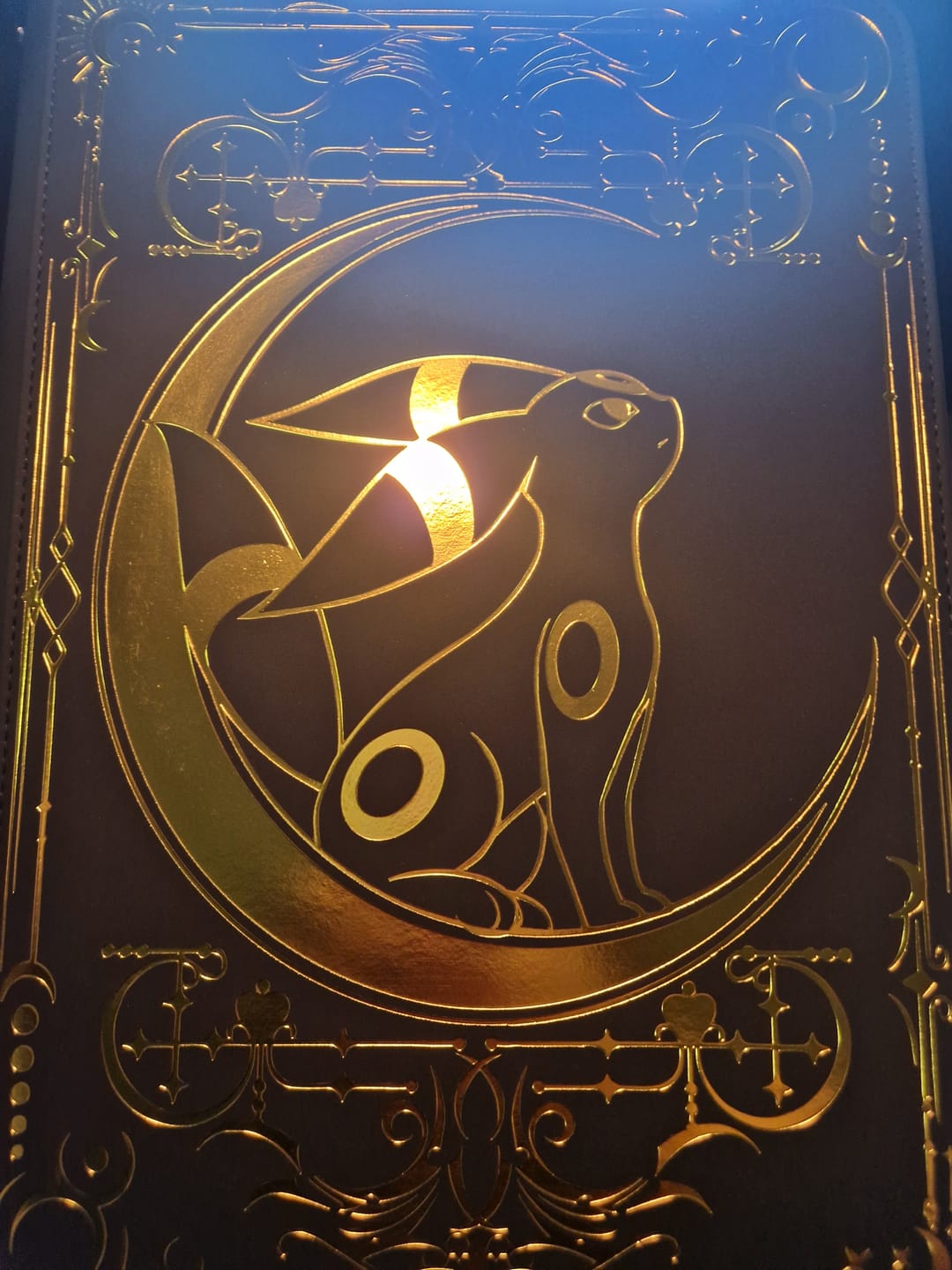 Customer photo review of Lunar Shadow 9-Pocket Trading Card Binder