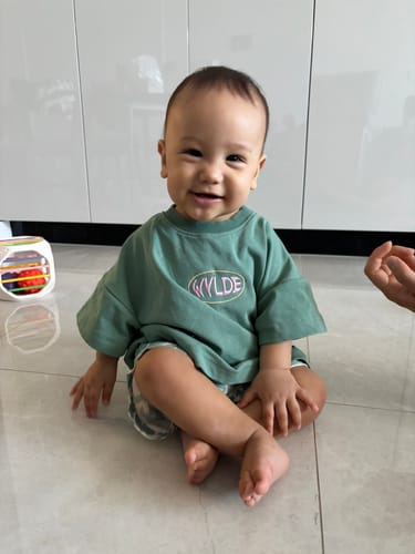 Customer photo review of Wylde Moss logo tee