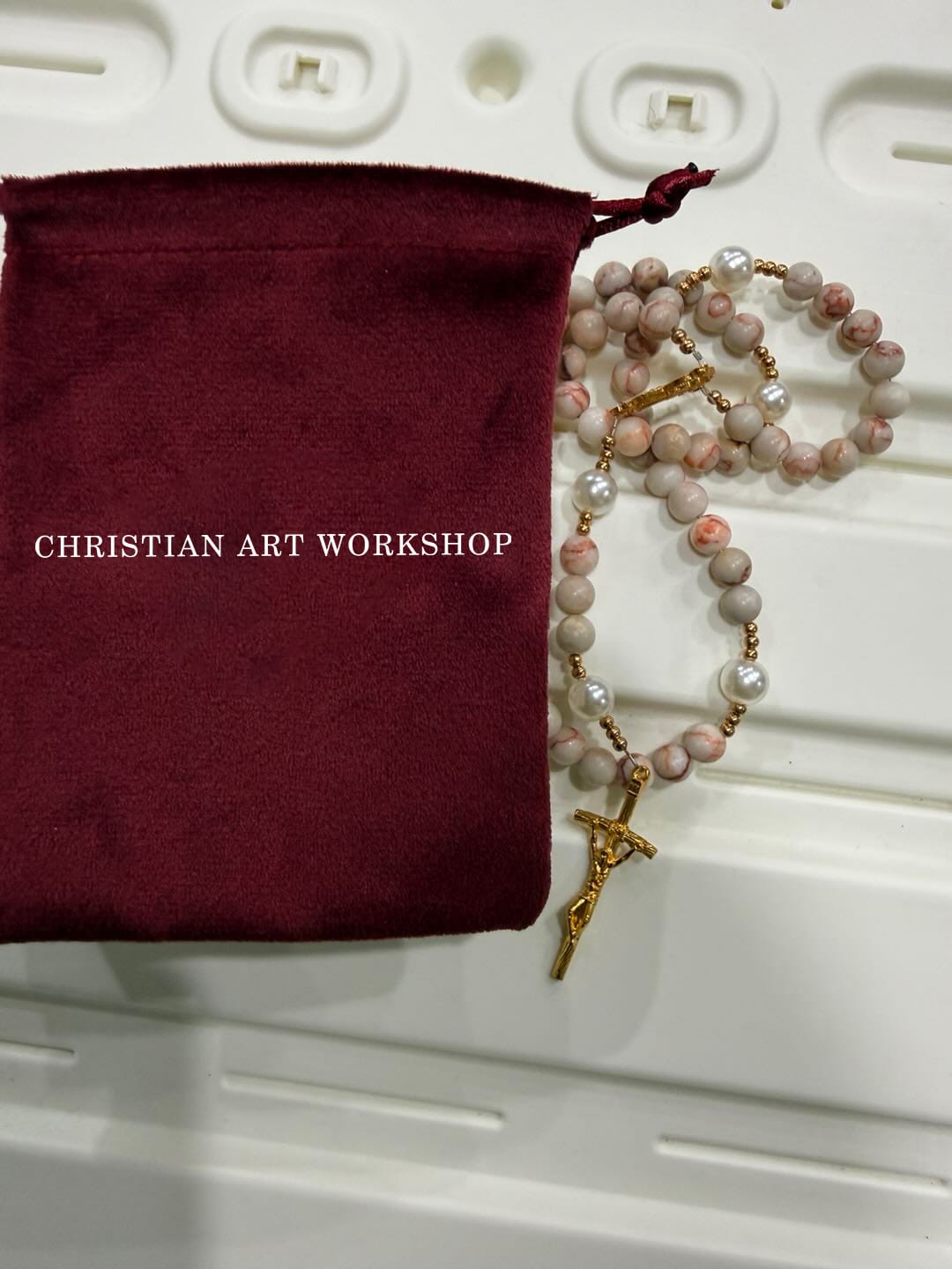 Customer photo review of CHRISTIAN ART WORKSHOP Matte Pink Zebra Jasper and Pearl Rosary with Miraculous Medal and Crucifix
