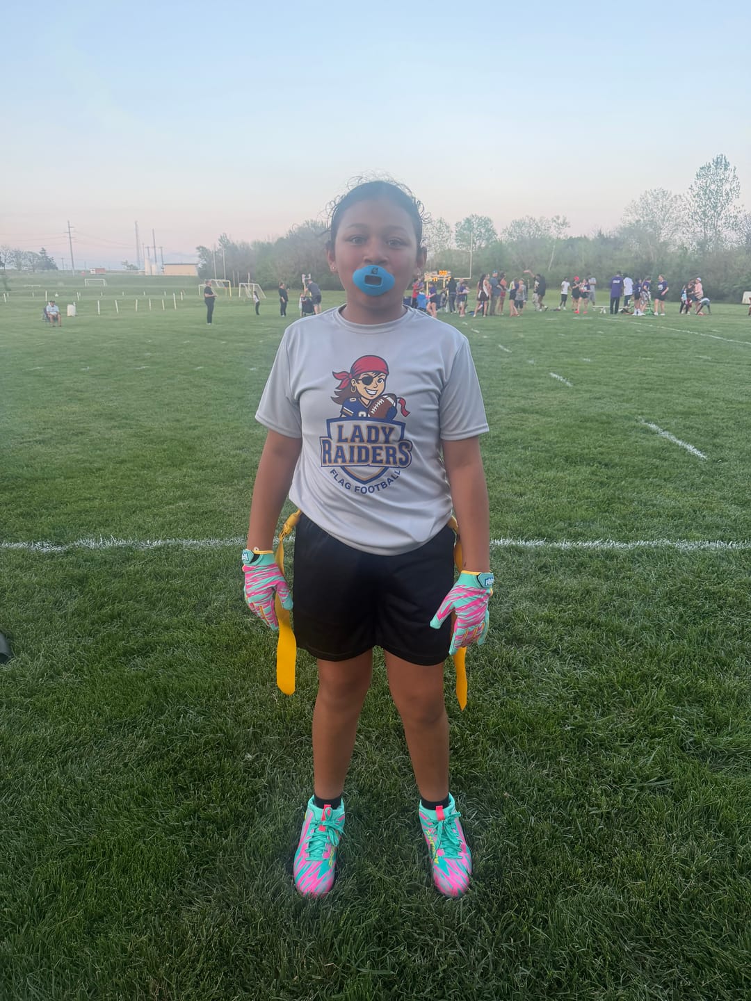 Customer photo review of Kool-Aid 'Sharkleberry Fin' Football Cleats - Quantum Speed by Phenom Elite