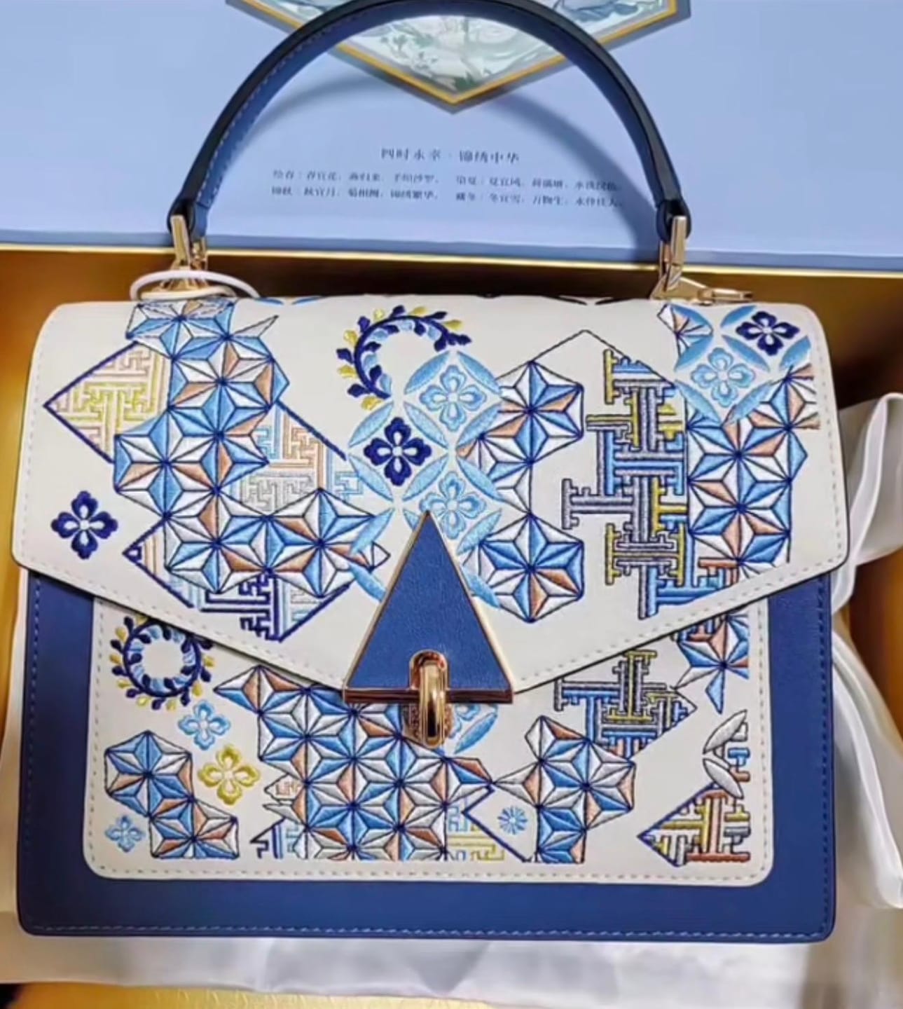 Customer photo review of Tang Red 24 Embroidered Suozi Pattern Top-Handle Bag