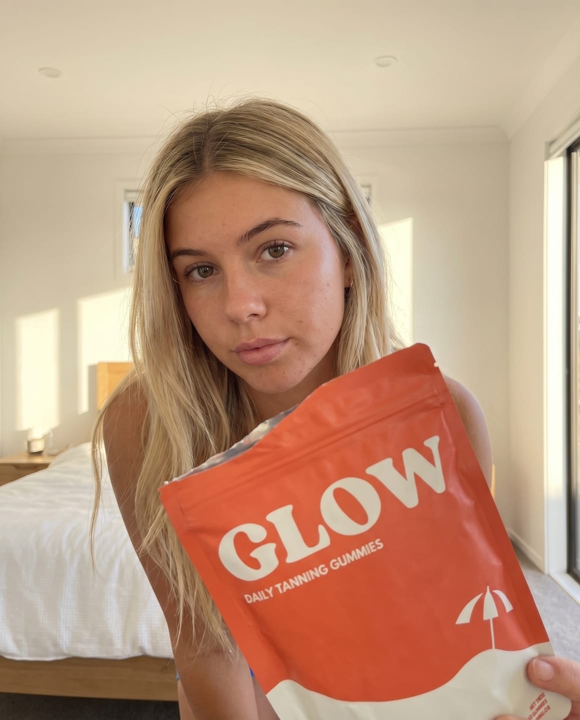 Customer photo review of Glow Tanning Gummies