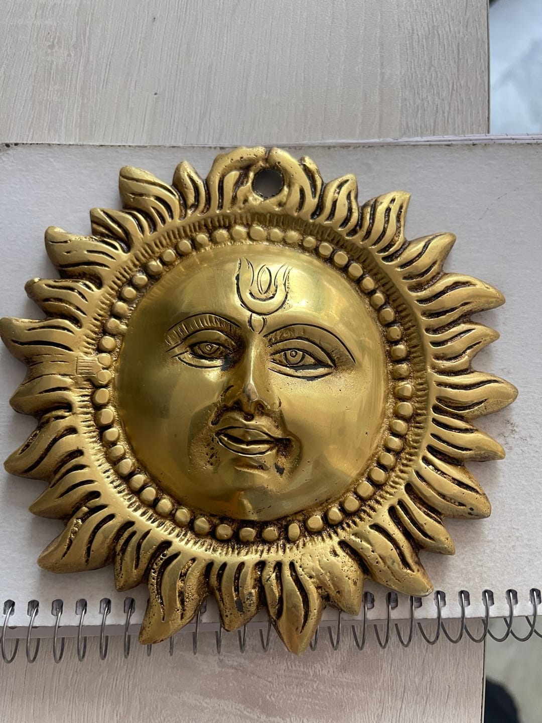 Customer photo review of Brass Vastu Sun Wall Hanging Idol Vastu Remedy for East Direction Balance, Fame and Positive Energy for Home, Office and Entrance Decor | 15 x 15 cm | 800 g