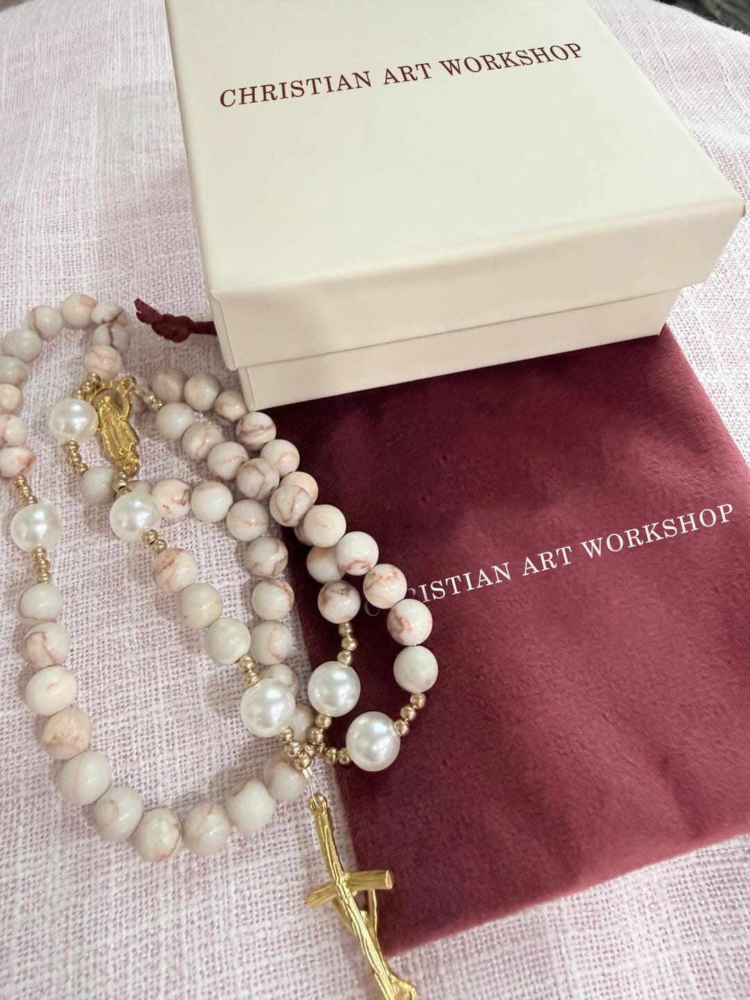 Customer photo review of CHRISTIAN ART WORKSHOP Matte Pink Zebra Jasper and Pearl Rosary with Miraculous Medal and Crucifix