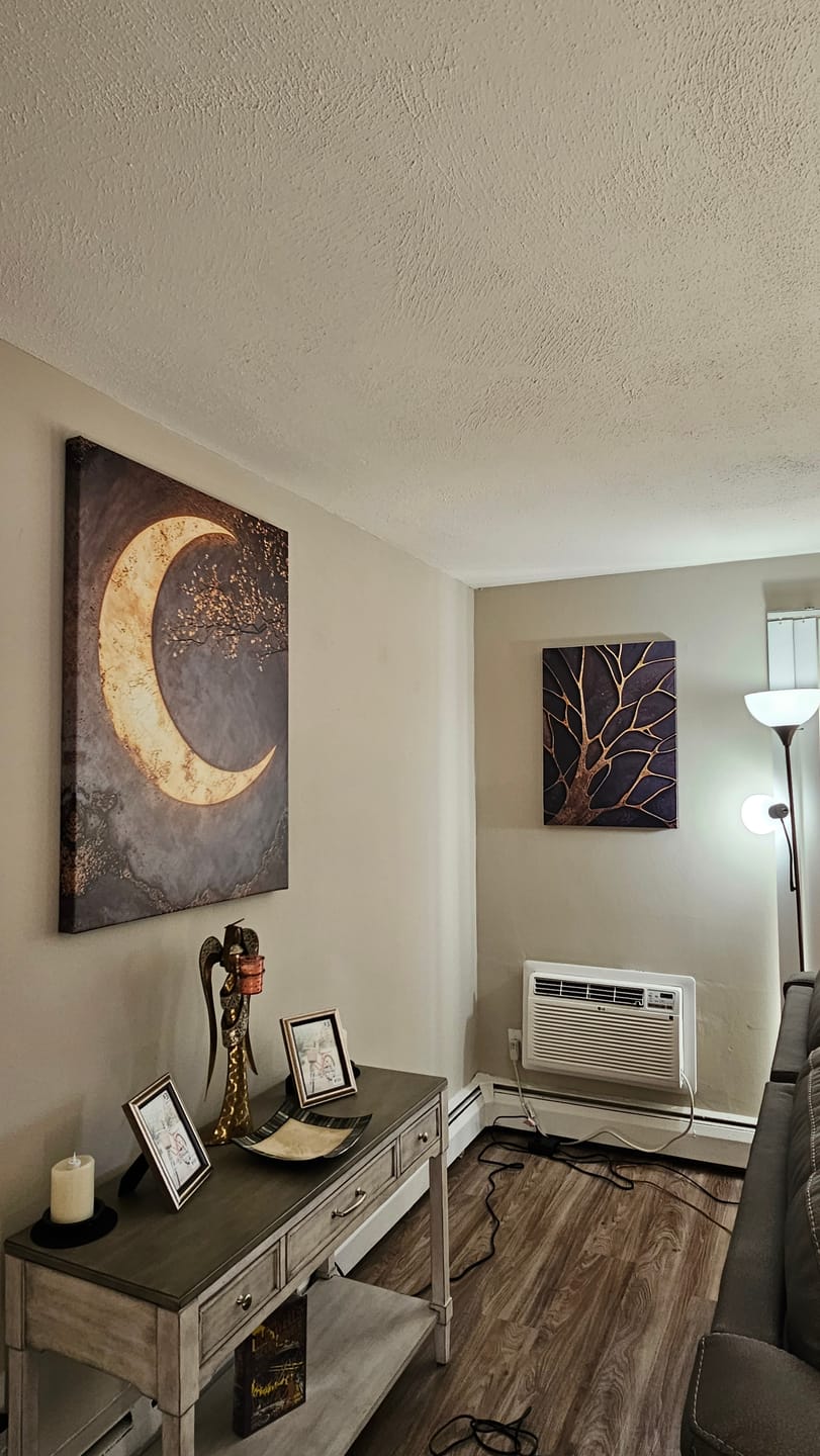 Customer photo review of Bronze Branches – Abstract Tree Silhouette Wall Art Canvas