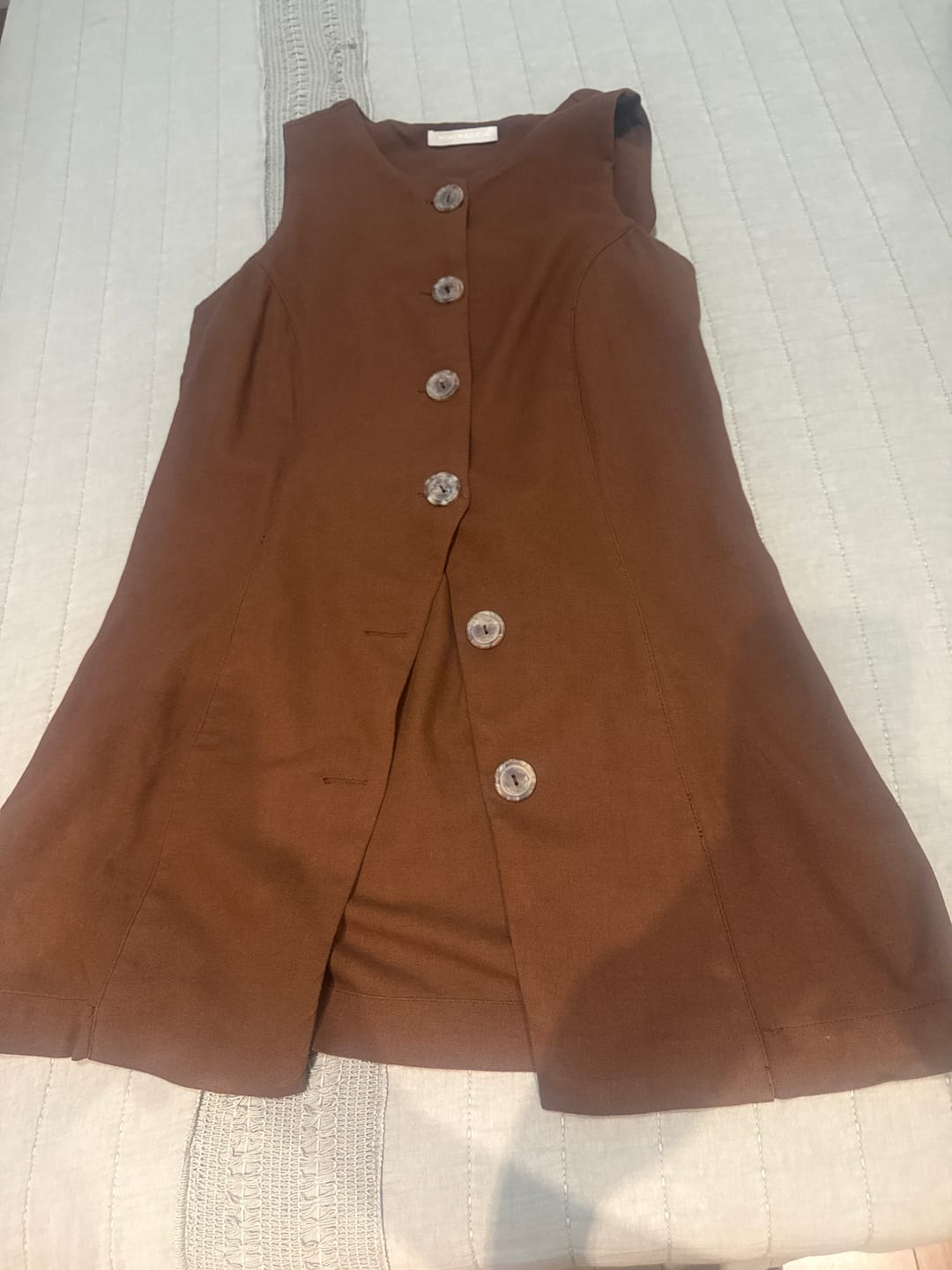 Customer photo review of Colete Embaúba Marrom Escuro