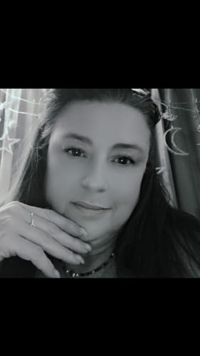 Close-up black and white photo of a reviewer wearing My Amazing Lashes Mascara with defined lashes.