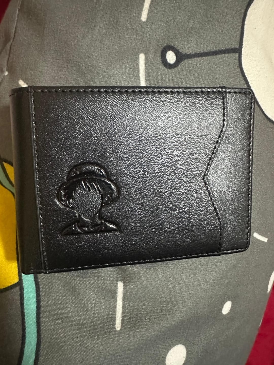 Customer photo review of Cartera Identidad Oscura