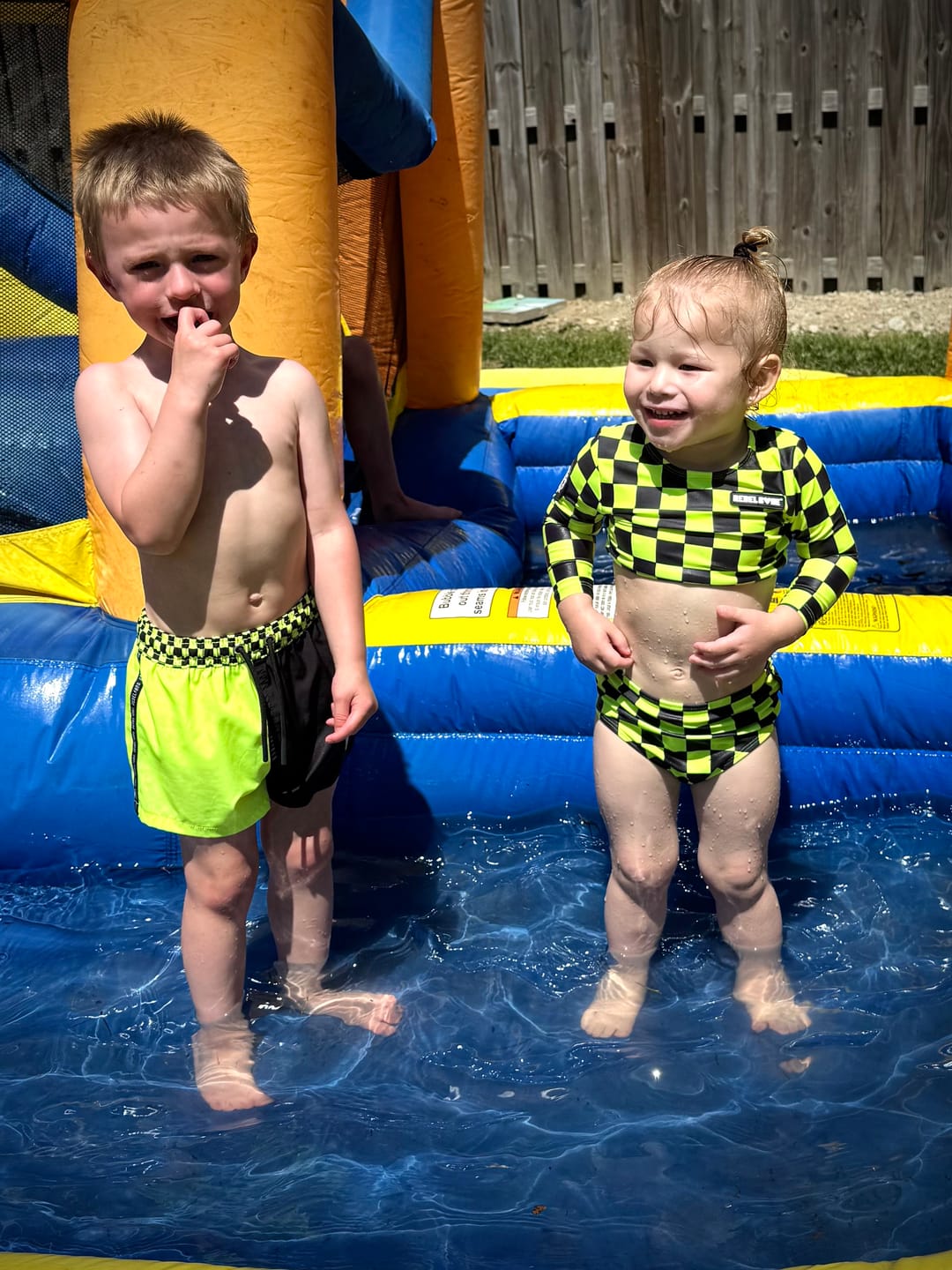 Customer photo review of Hybrid Swim Trunks in Neon Electric Lime + Black Colorblock