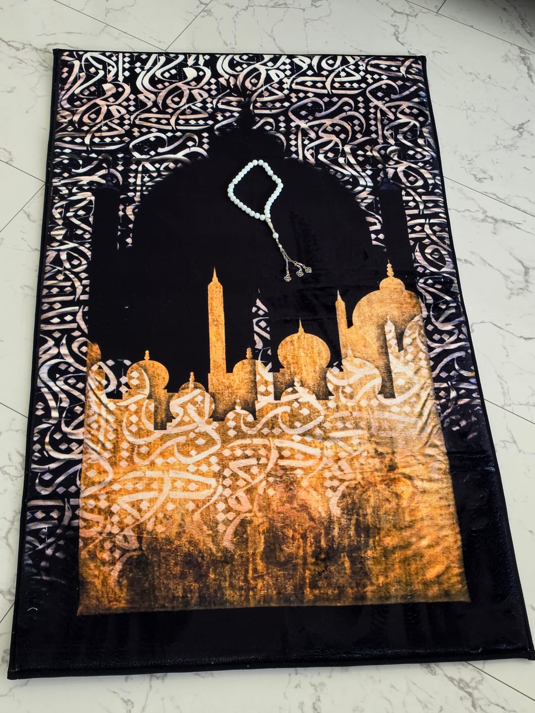 Customer photo review of Dark Arabic Calligraphy  Padded Prayer Mat